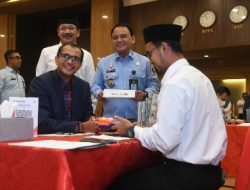 Kemenkumham Salurkan Zakat 1,4 Miliar melalui Baznas