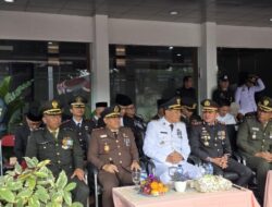 Kalapas Mukhlisin Fardi dan Ketua DWP Lapas Muara Enim Hadiri Upacara HUT Bhayangkara ke 79